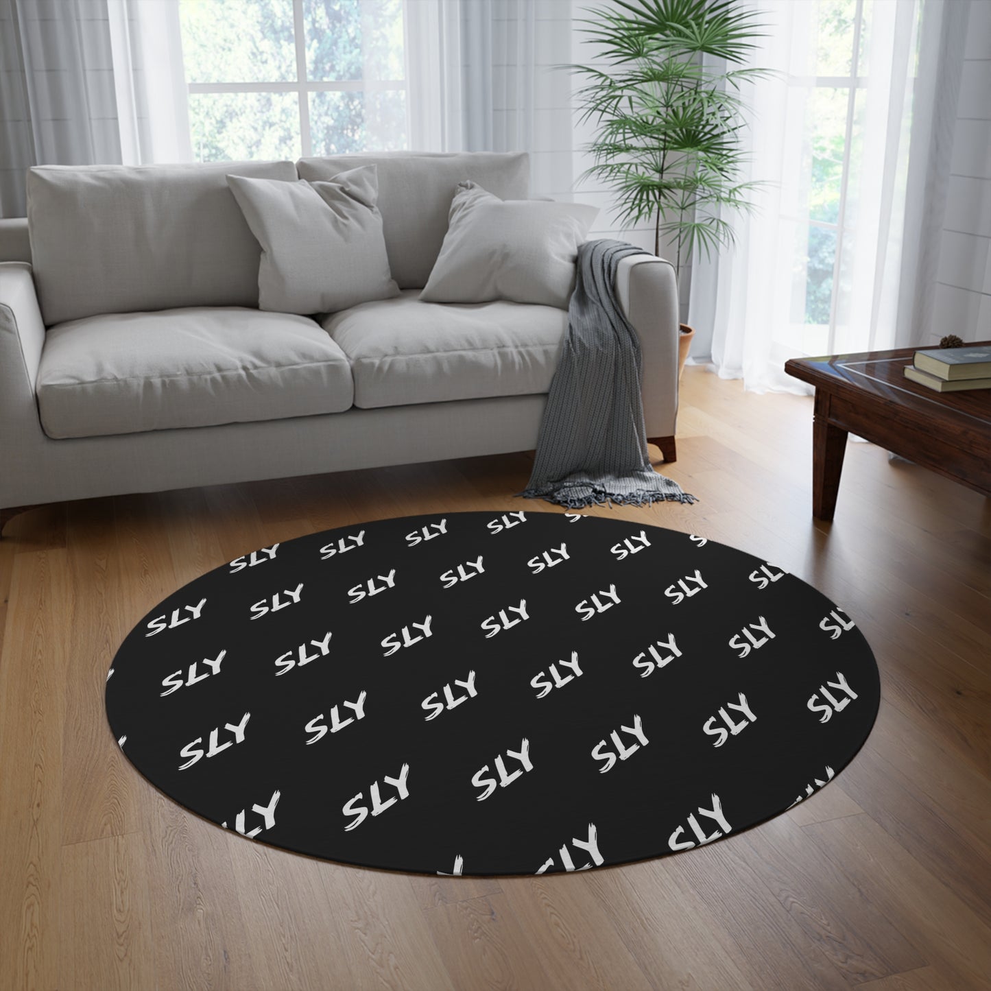 Sly Pattern Round Rug — Black Repeated "SLY" Accent Mat